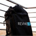 Black storage backpack with straps used to pack away the Revive Plunge Inflatable Barrel Plunge Tub outdoors