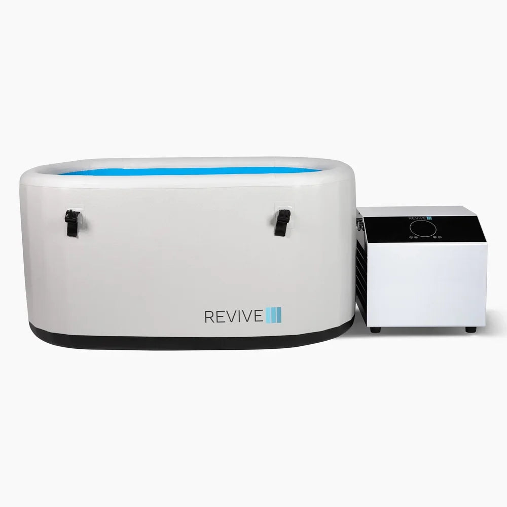 Front studio view of the open Revive Plunge Inflatable Cold Plunge with blue liner and side chiller
