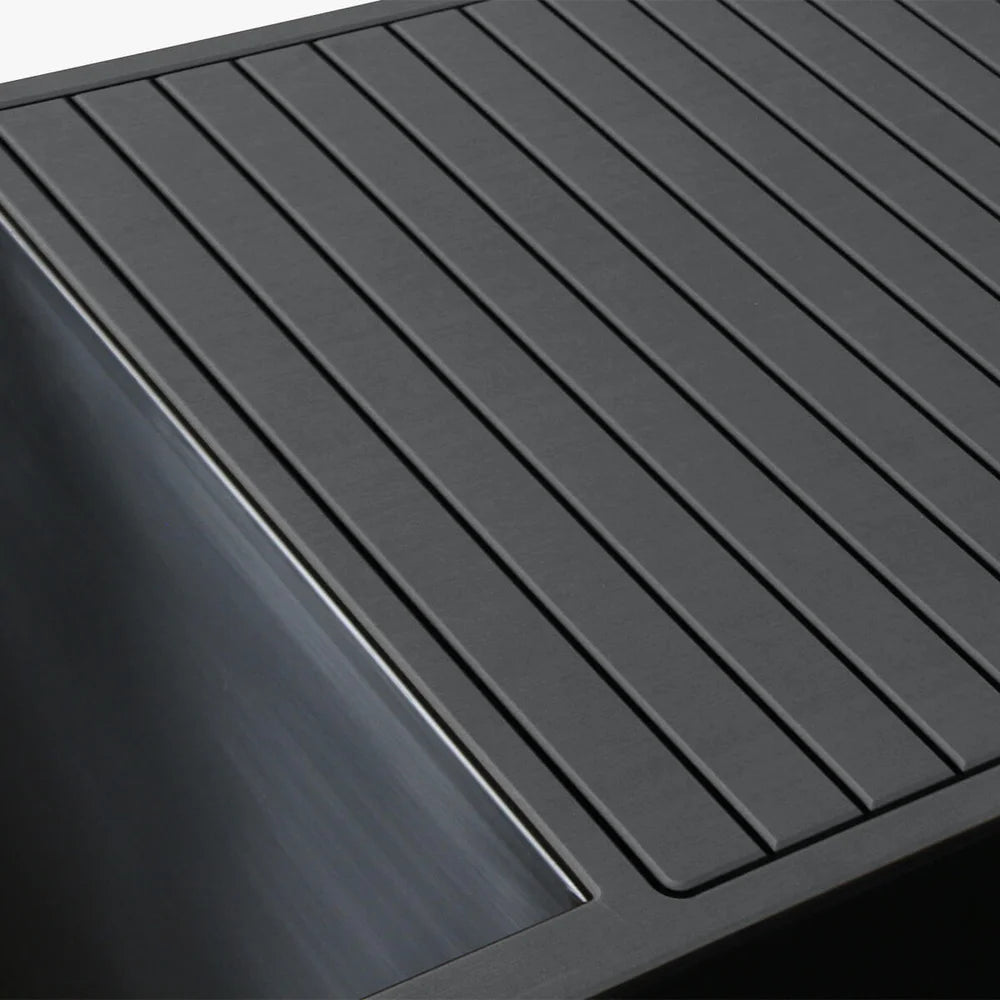 Grey slatted deck panel beside the stainless rim of the Revive Plunge Luxury Plunge Cold Plunge Spa