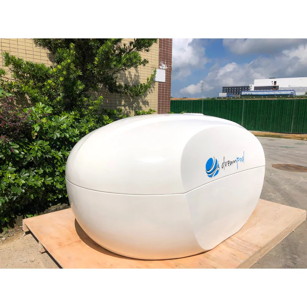 Glossy white Dreampod Home Float Plus Tank shown closed from the side with the lid seam visible