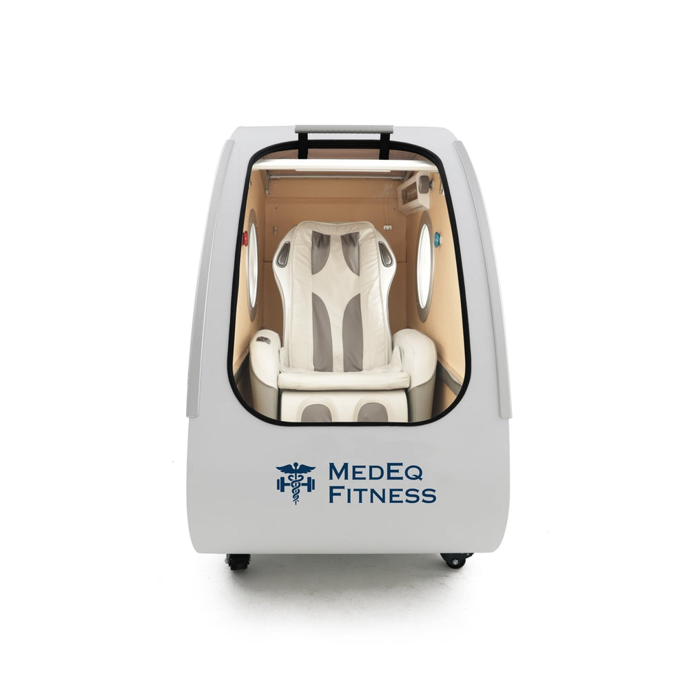 MedEq TimePod 2 triangular hard-shell hyperbaric chamber, white, front view showing seat