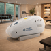 MedEq TimePod Air 1.5 Pro soft-shell hyperbaric chamber, white, in a home gym
