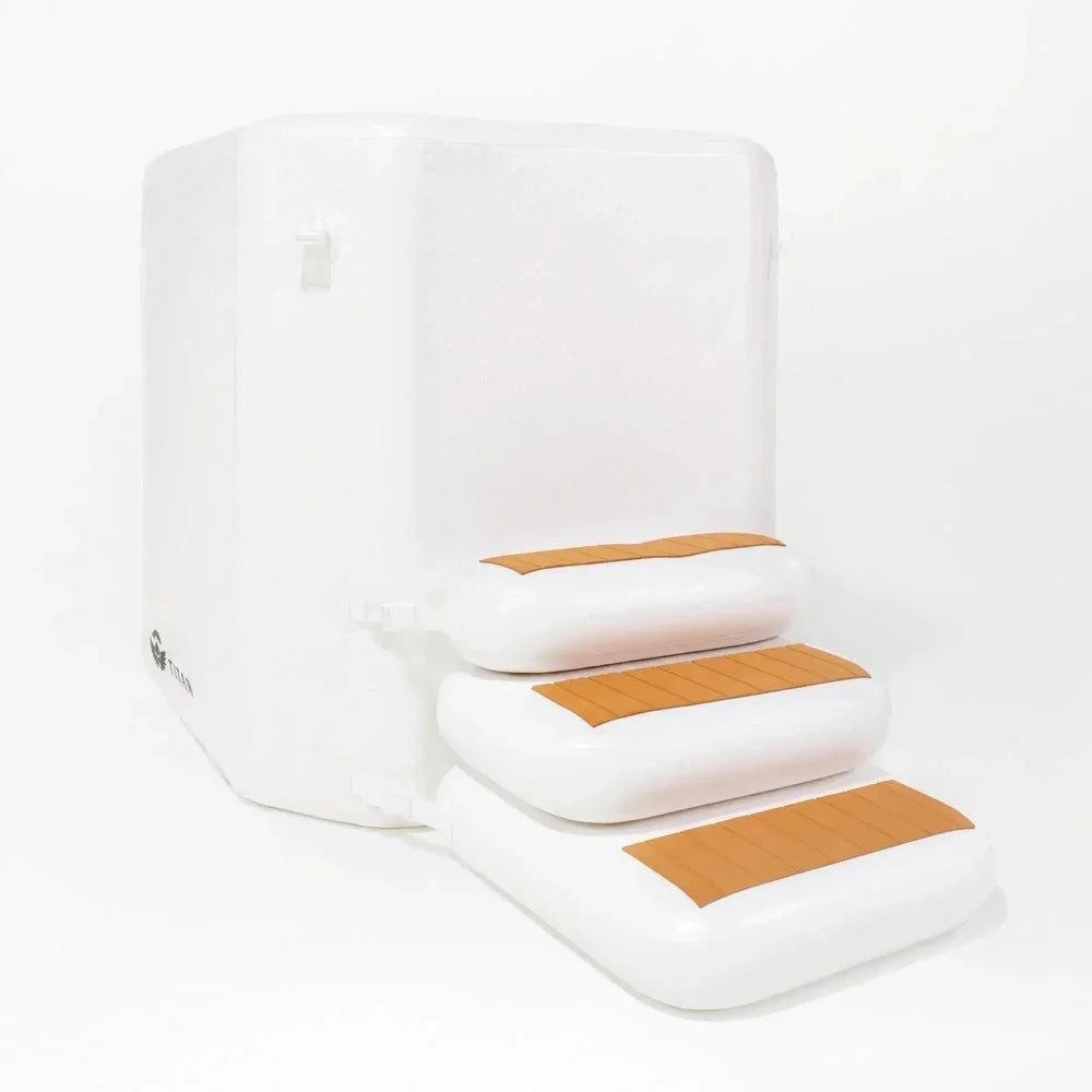 Uncovered Arctic White tub with clipped-on entry steps showing the Titan Atlas Cold Plunge Tub open rim