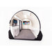Cutaway cabin of the TwinForce 2.0 ATA Multi-Person HBOT Chamber with Red Light showing quilted walls and wall-mounted TV