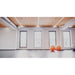 Rehabilitation studio with exercise balls and tall windows, a recovery space for the Vacu Activ Cryo Flow Cold Air Machine