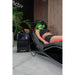 Hose linking the mobile oxygen unit to the Vacu Activ Red Couch Oxy Red Light Therapy Bed during treatment
