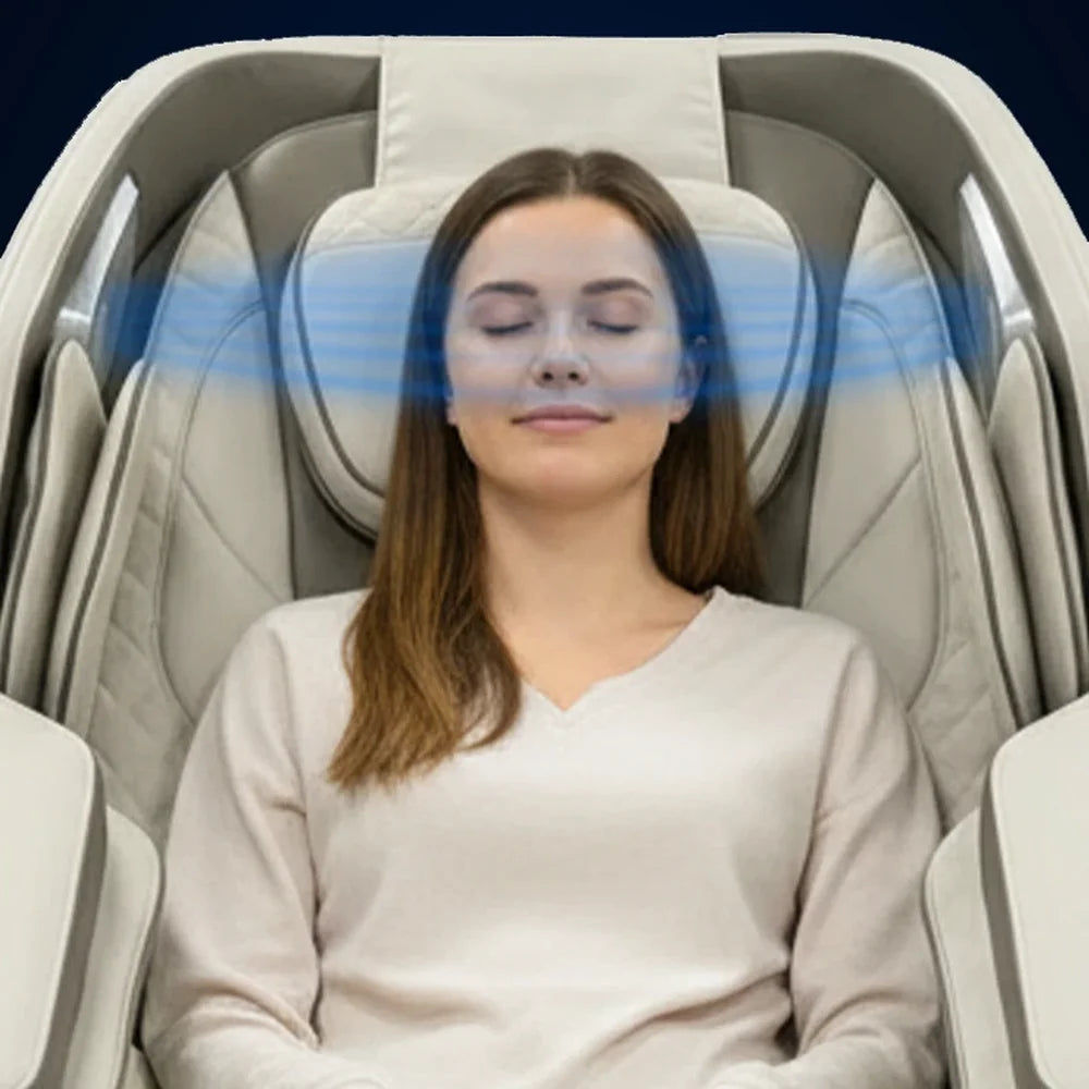 Blue air waves around the headrest as a woman rests in the Infinity Celebrity Elite Recliner ionizer demo