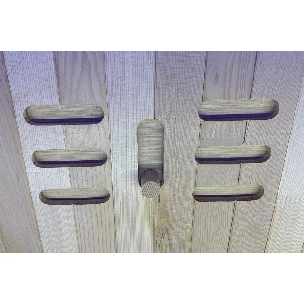 Slotted hemlock air vent with turn knob partly shut on the Blisspod Helsinki Full Spectrum Sauna wall