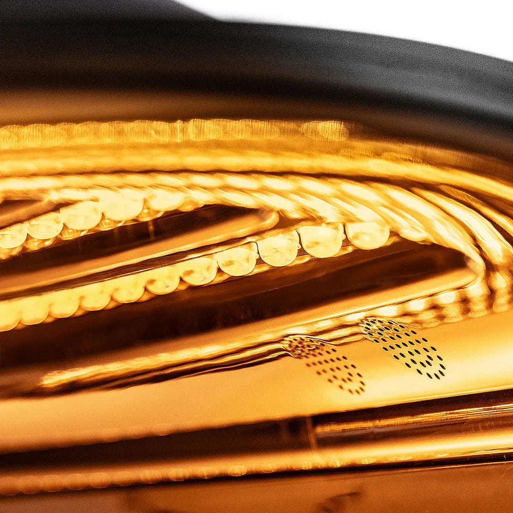 Warm yellow 590 nm diodes glowing across the mirrored inner panel of the Galaxy Zero Atlas LED Light Therapy Capsule