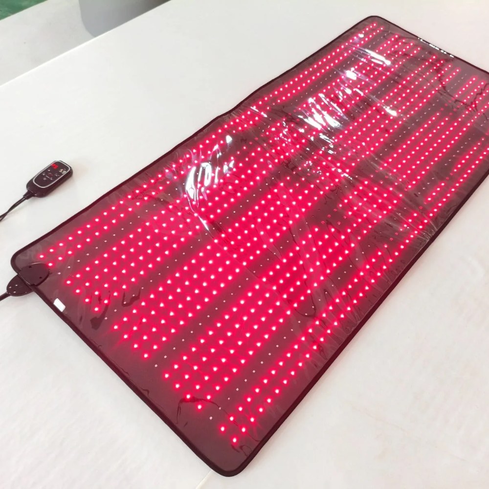 ZAQ LIVO red light therapy mat on the floor